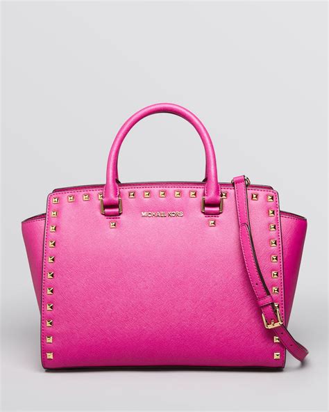 michael kors baby pink satchel|Michael Kors pink studded purse.